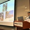At the 2025 Arizona Transportation Institute Summit, U of A assistant professor Tejo Bheemasetti shows data associated with the number of battery-laden EVs on the road.