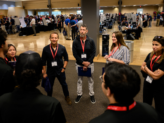 Team 24024 presents CAT Hub to a panel of industry judges at the 2024 Craig M. Berge Design Day.