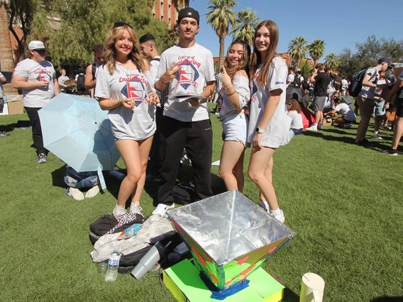 Students show off their projects at the University of Arizona College of Engineering's Solar Oven Throw Down. 