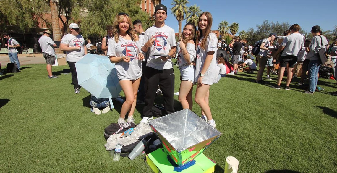 Students show off their projects at the University of Arizona College of Engineering's Solar Oven Throw Down. 