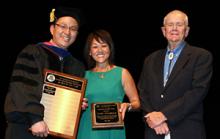 2017 Alumni of the Year awardee Cindy Klingberg is flanked by Young-Jun Son, left, head of the Department of Systems and Industrial Engineering, and Herb Burton, last year’s inaugural recipient, at a precommencement program in May.