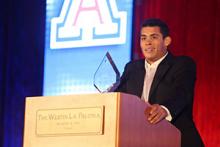 Rafael Quintero accepts the 2016 Sapphire Award for top senior male student-athlete at the University of Arizona. Photo courtesy of Stan Liu/Arizona Athletics.