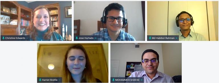 Screenshot of a Zoom meeting with five smiling people.